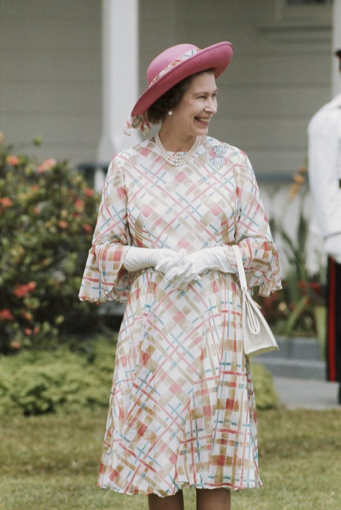 Queen Elizabeth II outside the palace of King Taufa'ahau Tupou IV of Tonga, during her visit to Tonga, February 1977. 