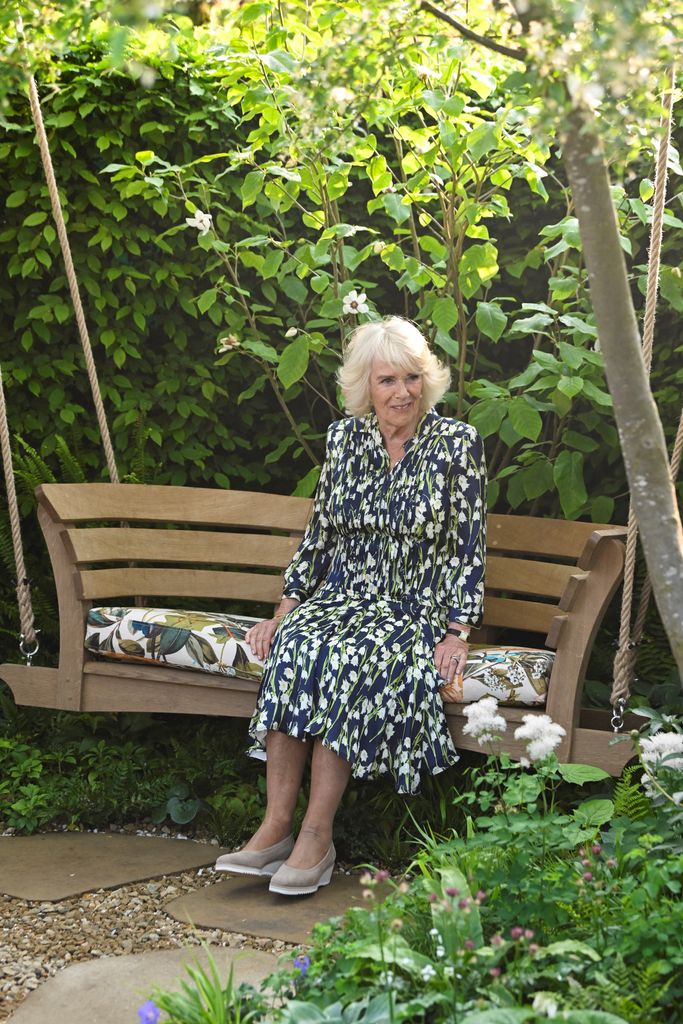 Queen Camilla enjoys a swing bench at Chelsea Flower Show