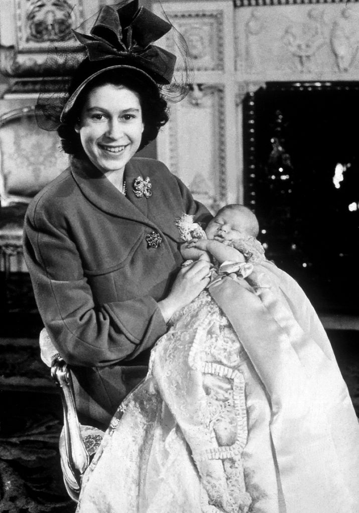 The Queen holding a baby Prince Charles