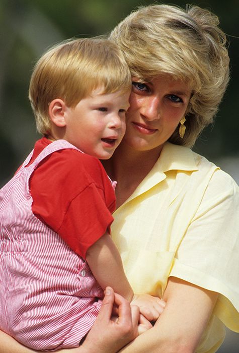 Princess Diana pictured carrying young Prince Harry