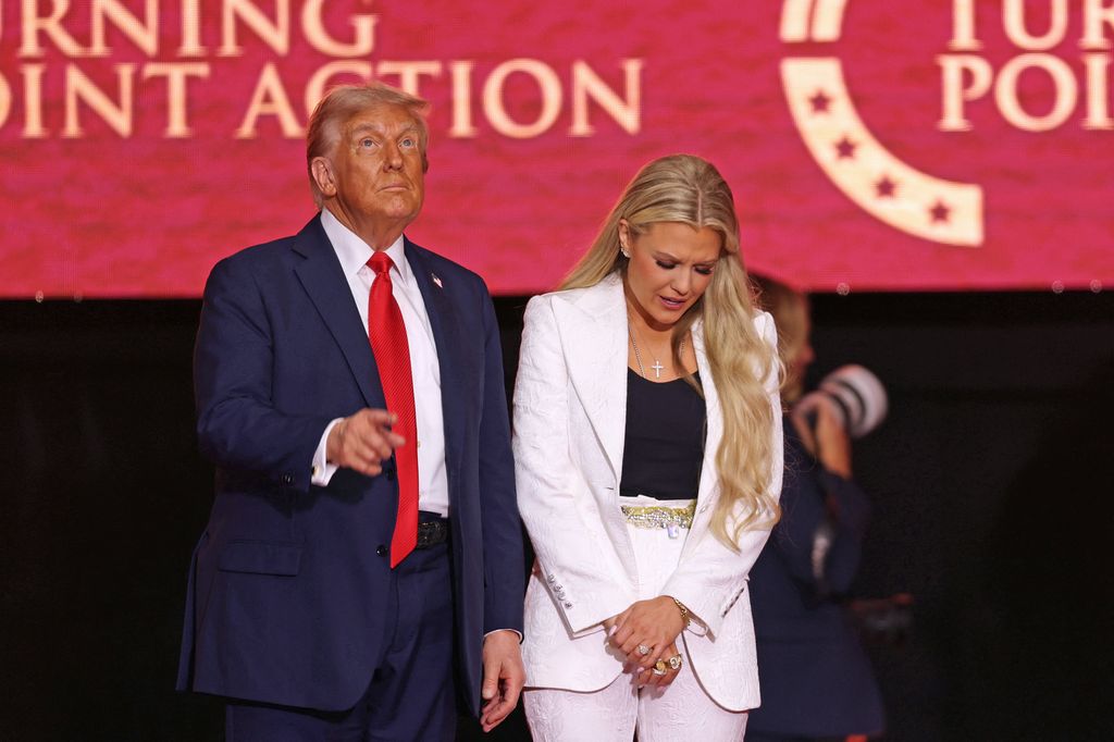 Trump stands with Erika Kirk      