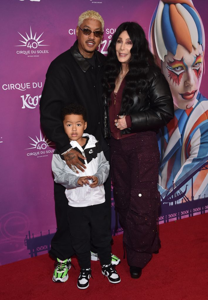 US singer and actress Cher (R), boyfriend US producer Alexander Edwards and his son Slash attend Cirque du Soleil's KOOZA red carpet premiere