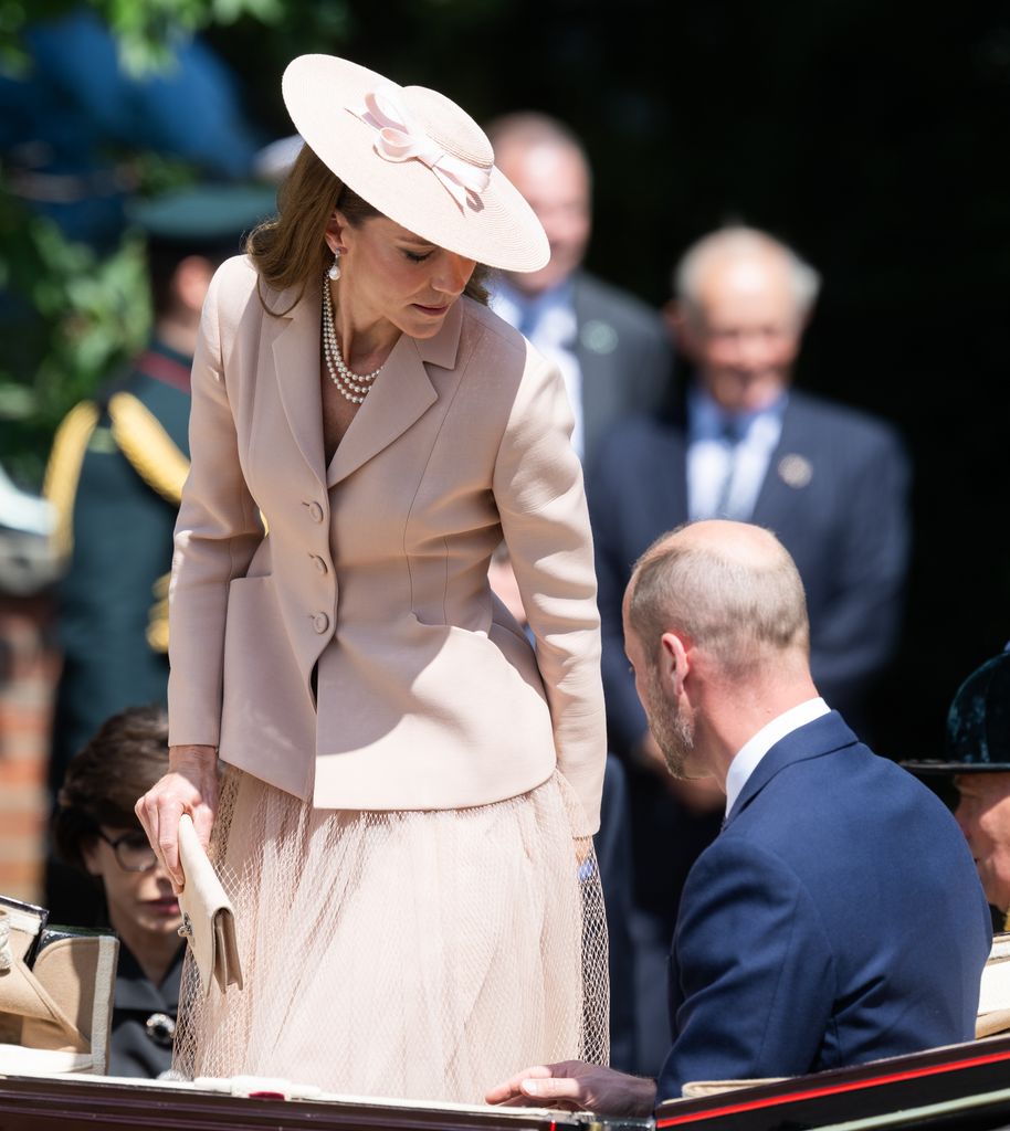 William helped Kate into the carriage
