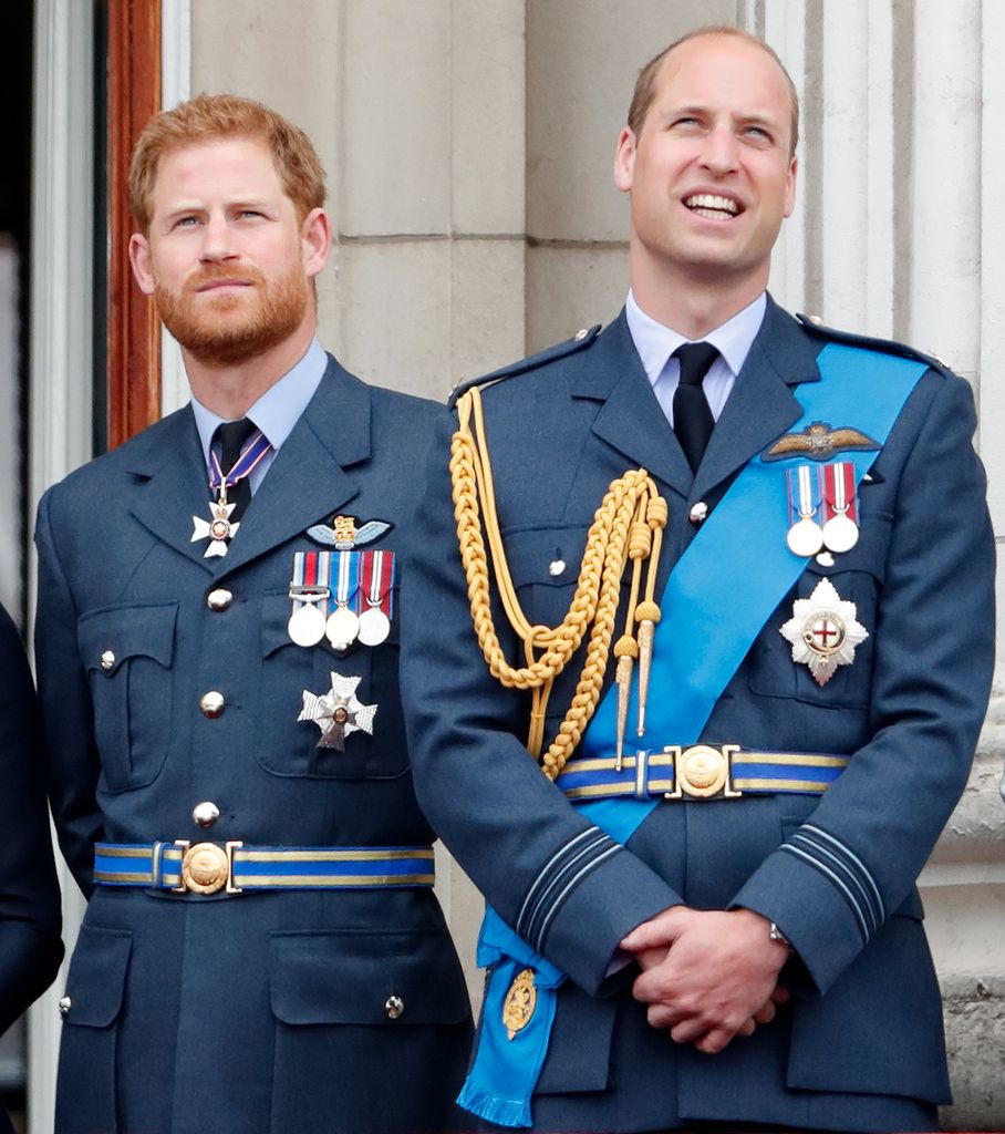 William and Harry on balcony in military uniform