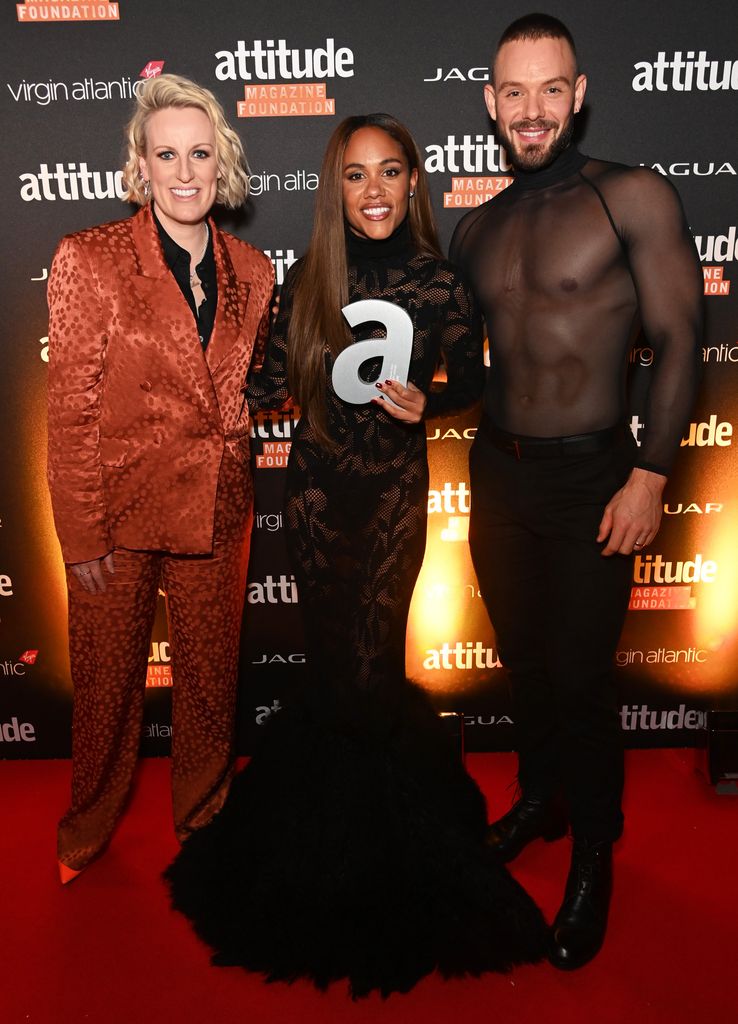 Steph McGovern, Alex Scott and John Whaite pose in the Winners Room at The Virgin Atlantic Attitude Awards 2023