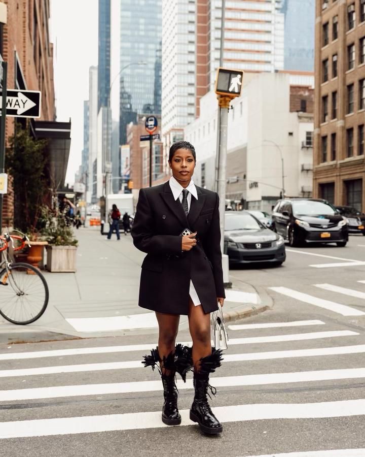 Jenee' Naylor walks across the crosswalk at NYFW