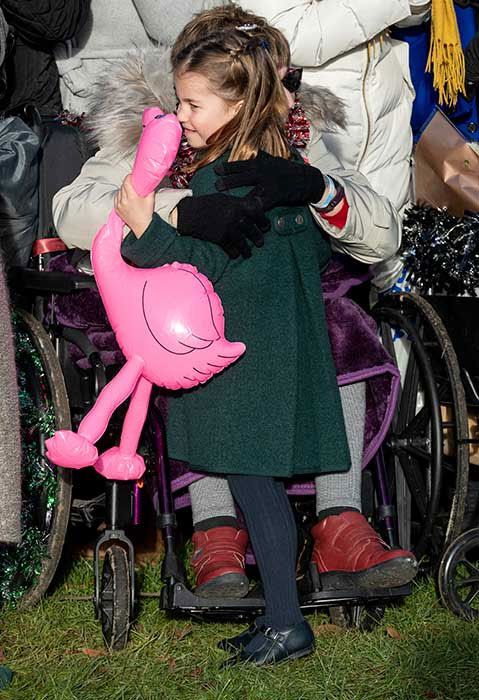 Princess Charlotte hugging royal fan