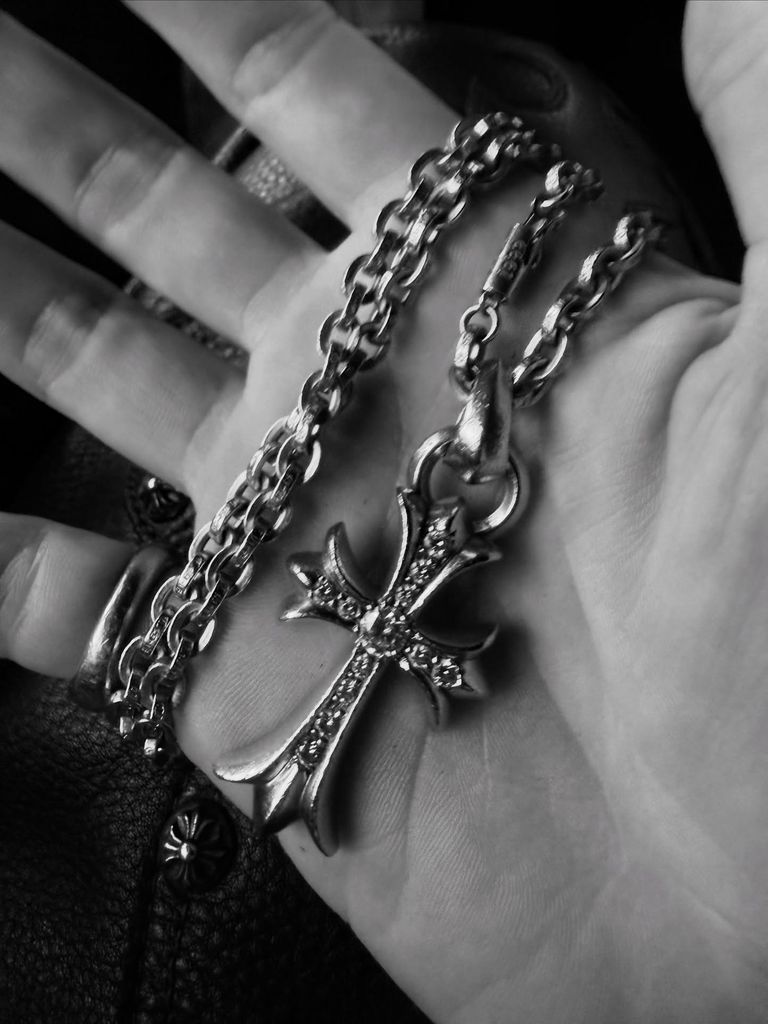 ozzy osbourne cross pendant in yungblud's hand