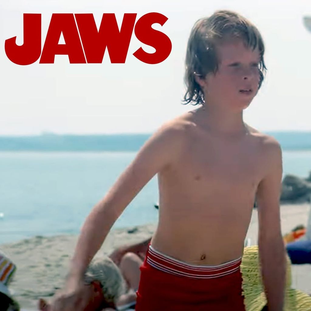 Jeffrey Voorhees as a child in red swimming shorts in film Jaws