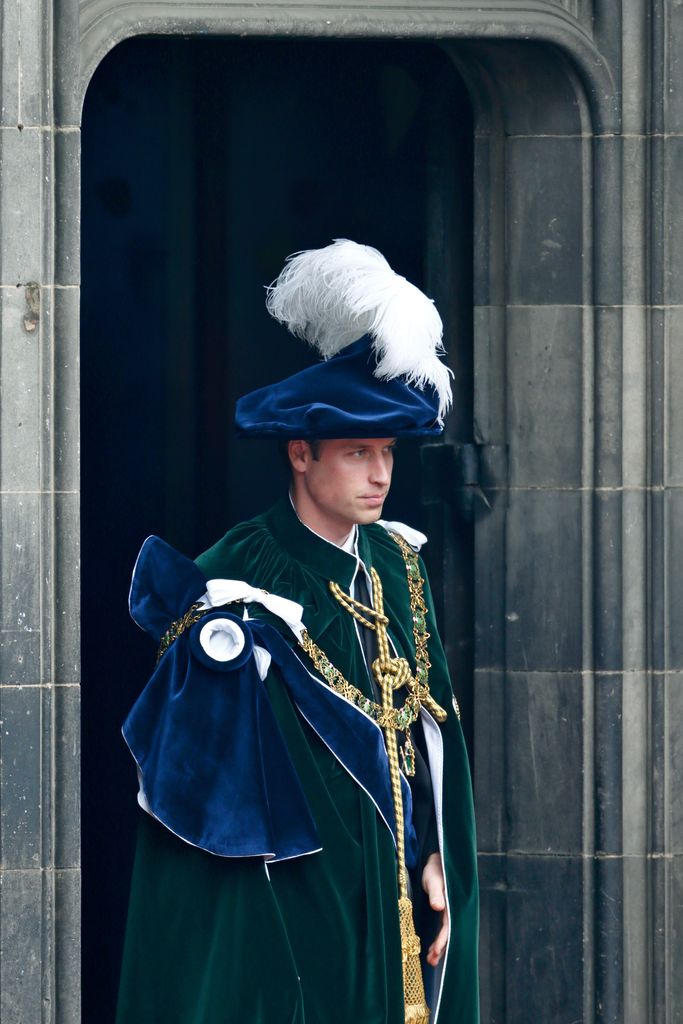 Prince William in blue feather hat
