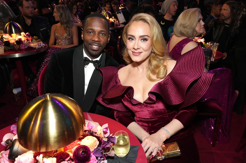 Adele and Rich at the Grammys sat smiling at the camera