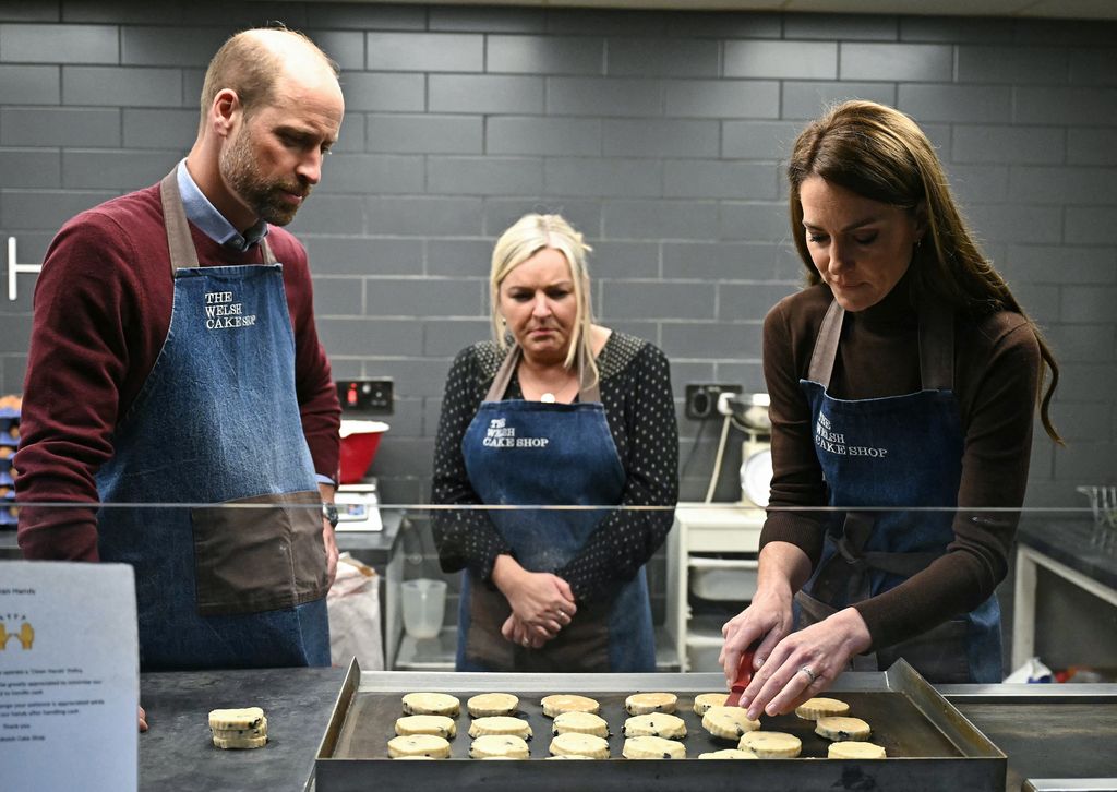 Kate places Welsh Cakes onto a tray for baking        