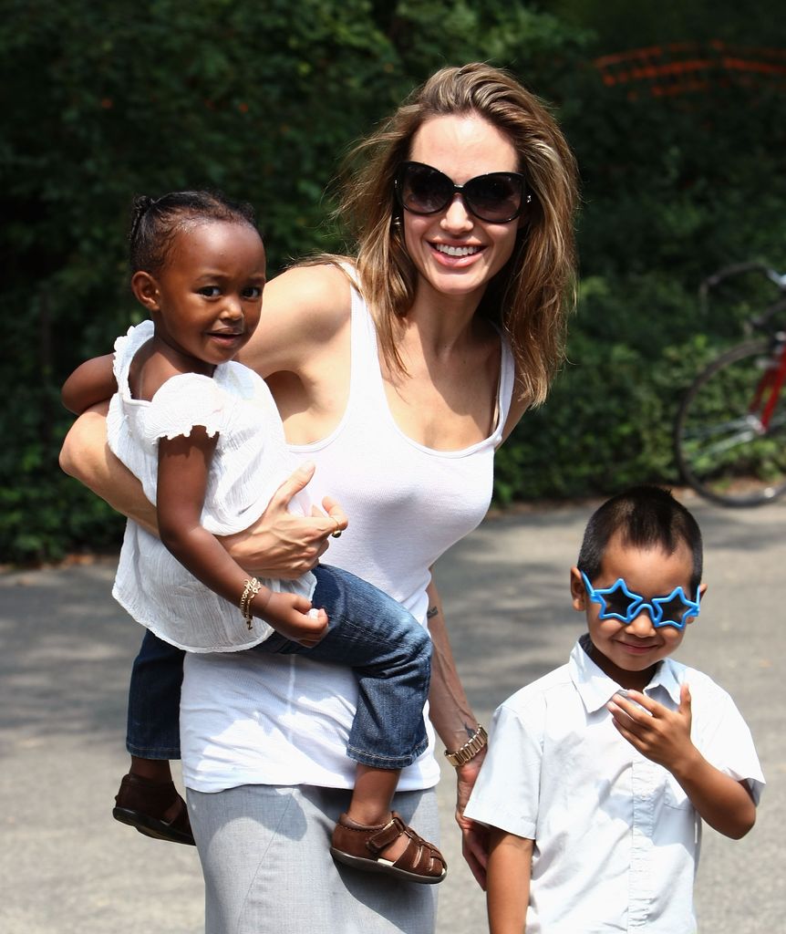 Angelina pictured with daughter Zahara and Maddox as the visit the Central Park Carousel in New York City in 2007
