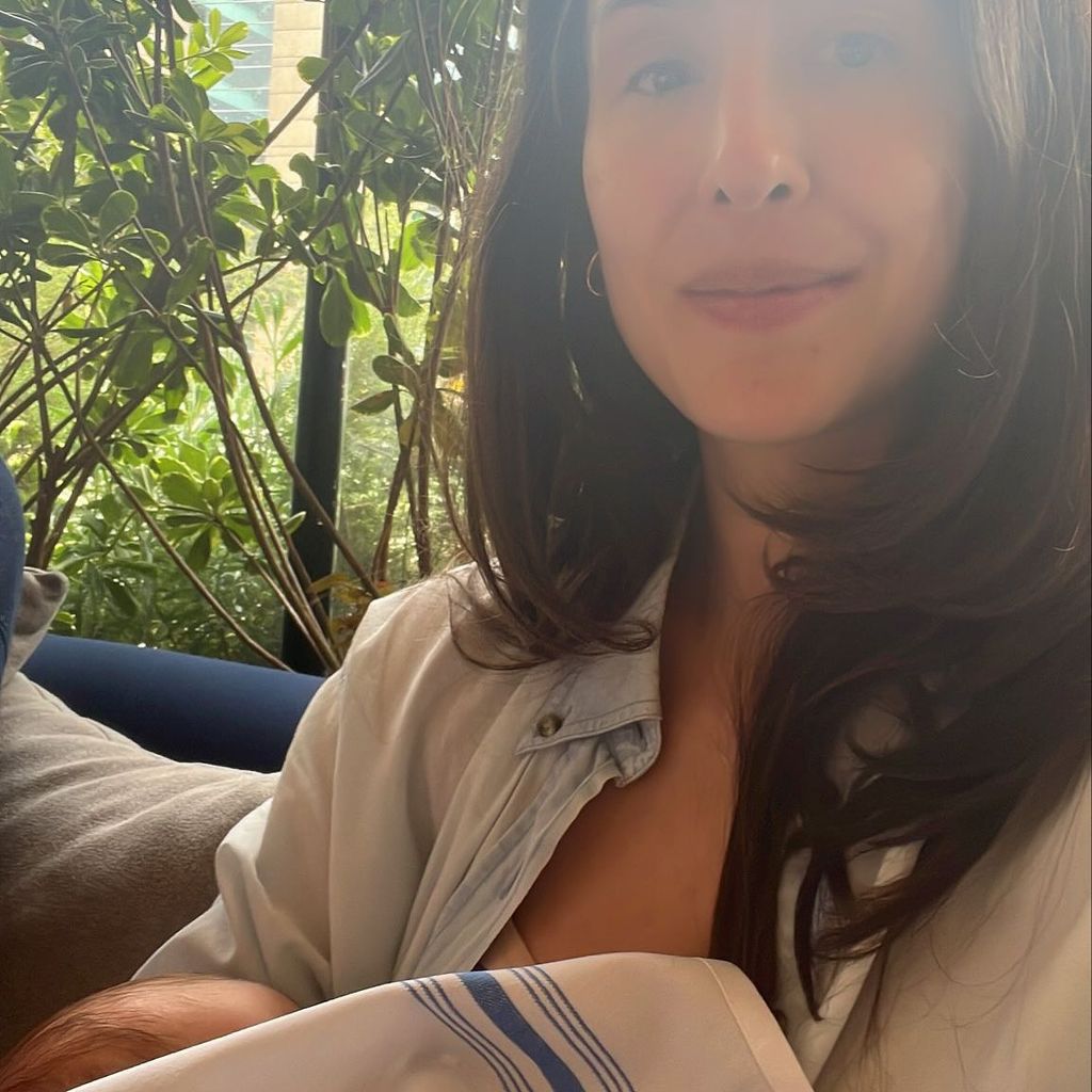 Princess Claudia holding baby