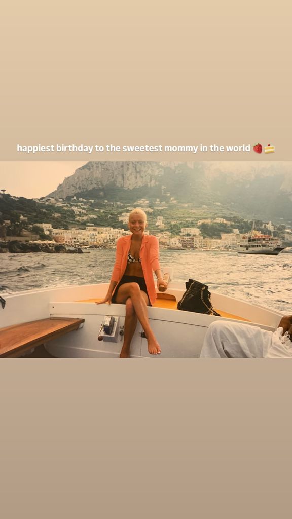 Kelly Ripa poses on a boat in a throwback tribute shared by her daughter Lola Consuelos on Instagram