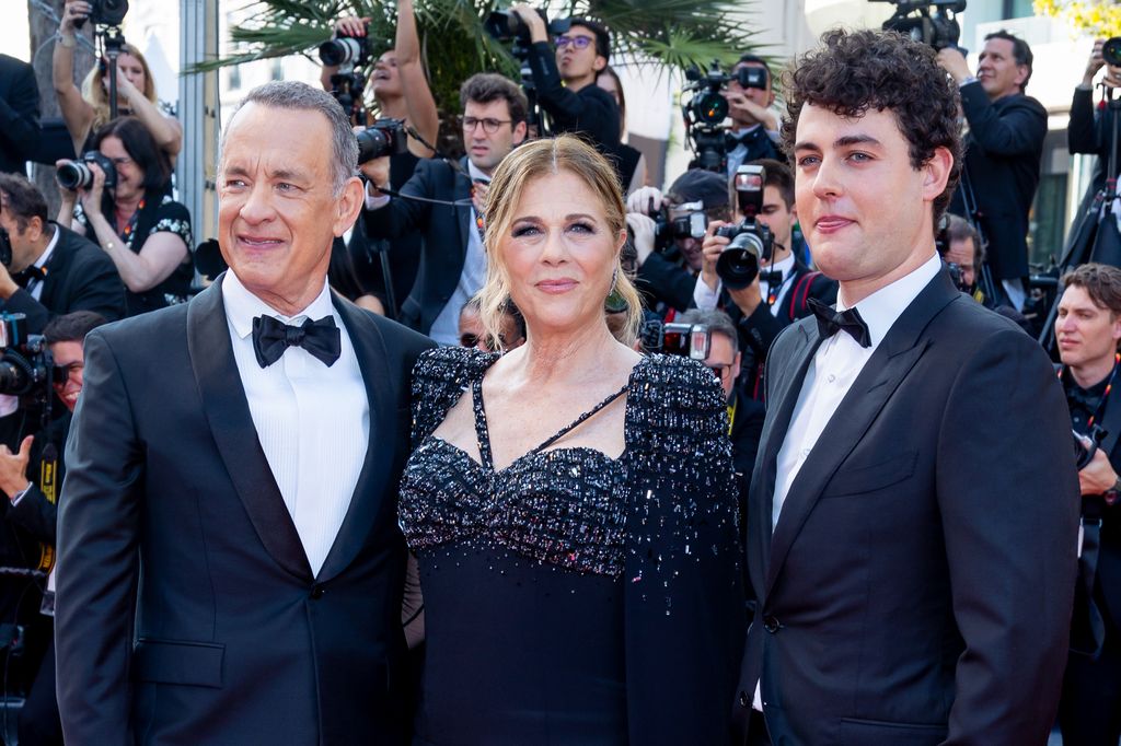 Tom Hanks, Rita Wilson and Truman Hanks attend the "Asteroid City" red carpet during the 76th annual Cannes film festival at Palais des Festivals on May 23, 2023 in Cannes, France