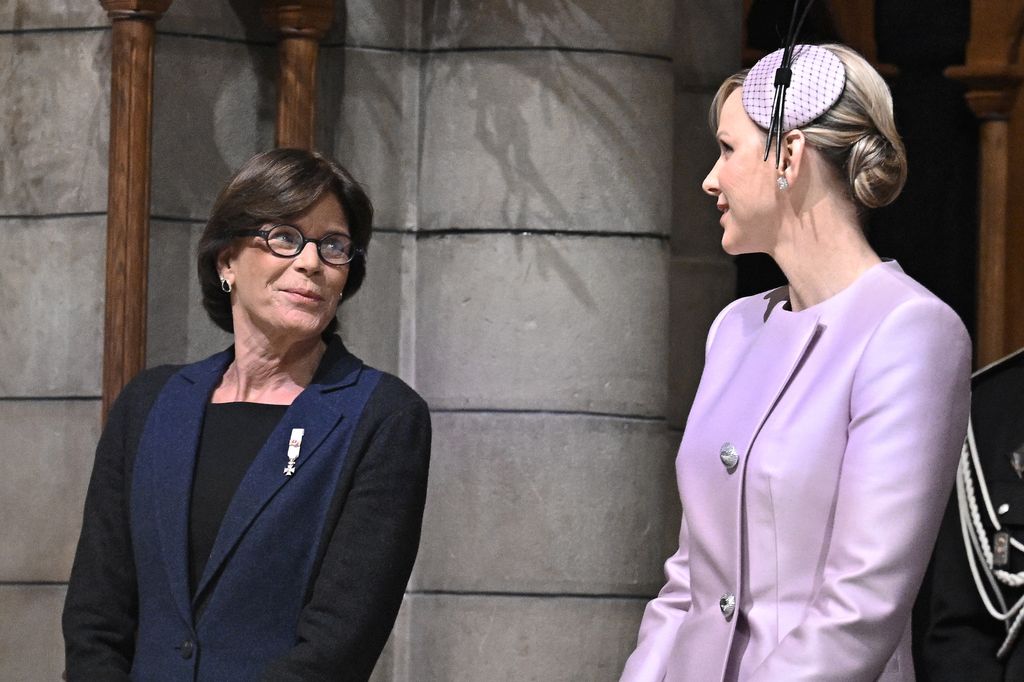 Princess Stephanie of Monaco and Princess Charlene talking