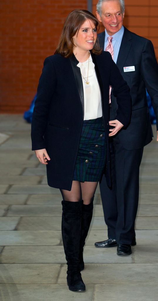 Princess Eugenie in tartan mini skirt, black boots and white blouse