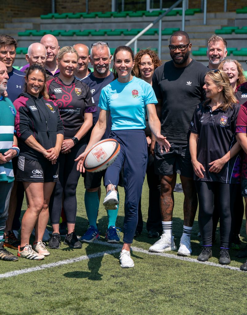 Kate poses for a group photo at Maidenhead Rugby Club