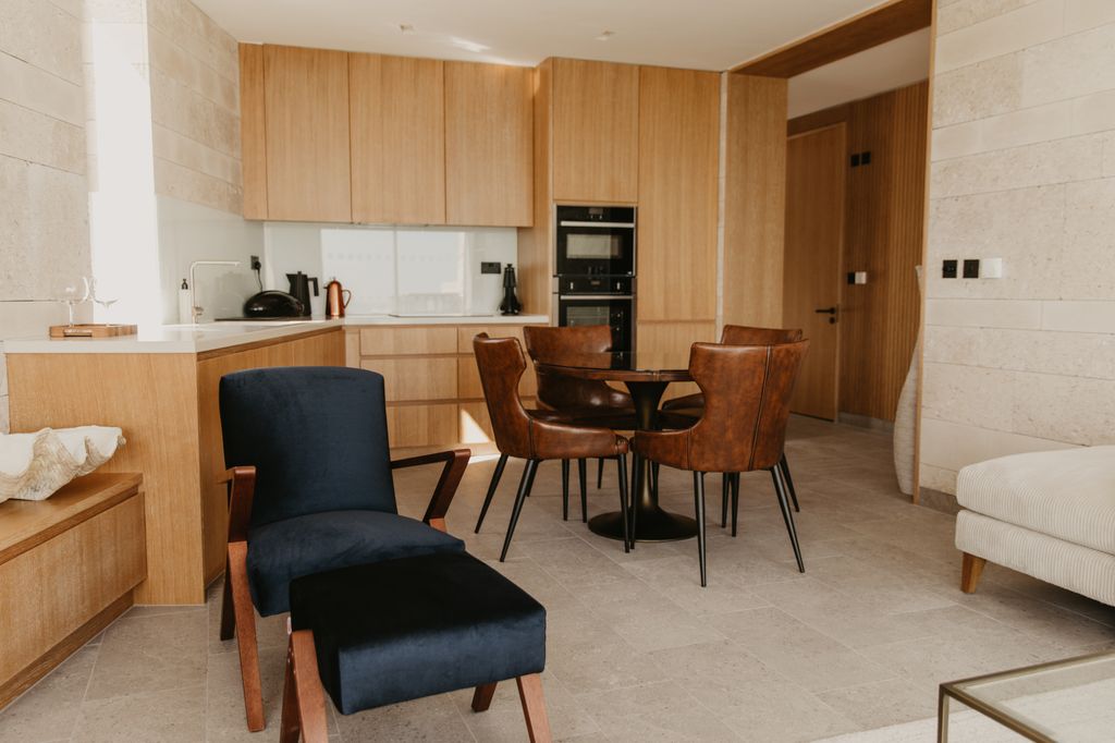 Blue lodge kitchen and dining room at Clifftops on Pennsylvania Castle Estate