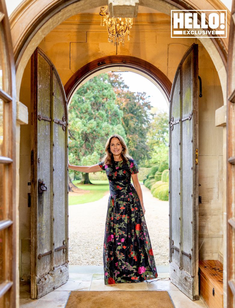 Nicola Reed in floral dress at Wiltshire home 