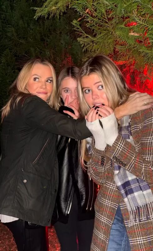 Amanda Holden and her two daughters pretending to be scared