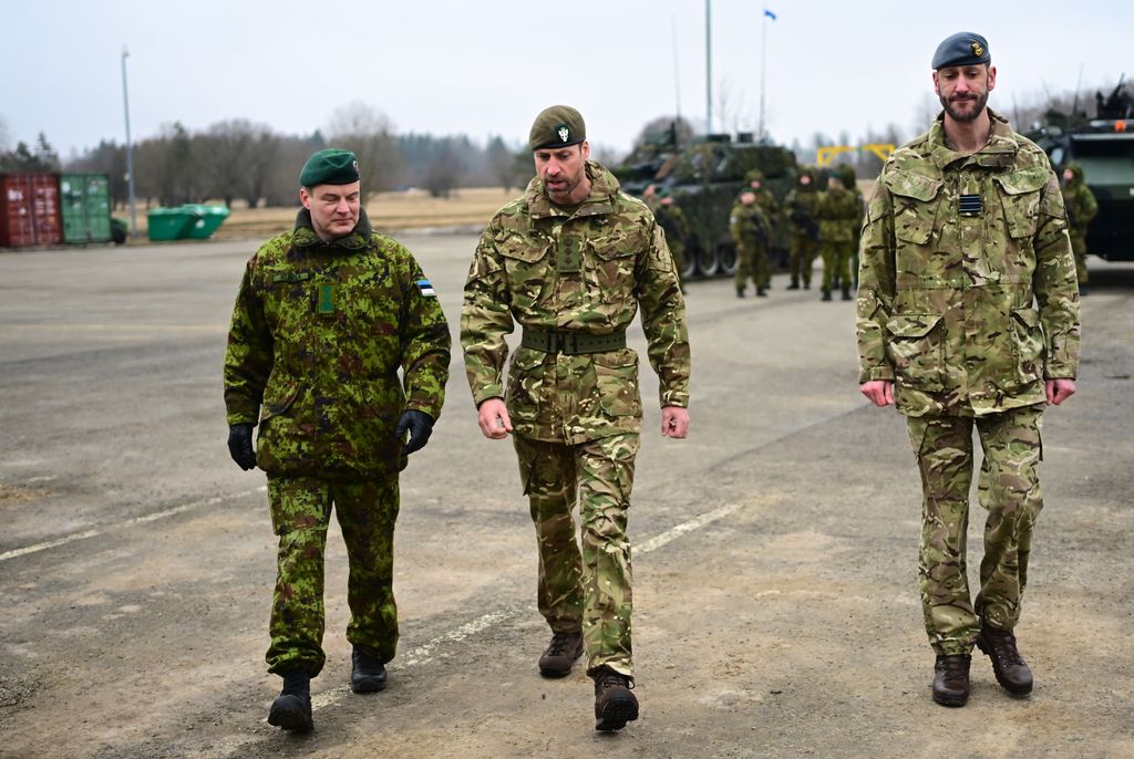 Prince William walking with soldiers