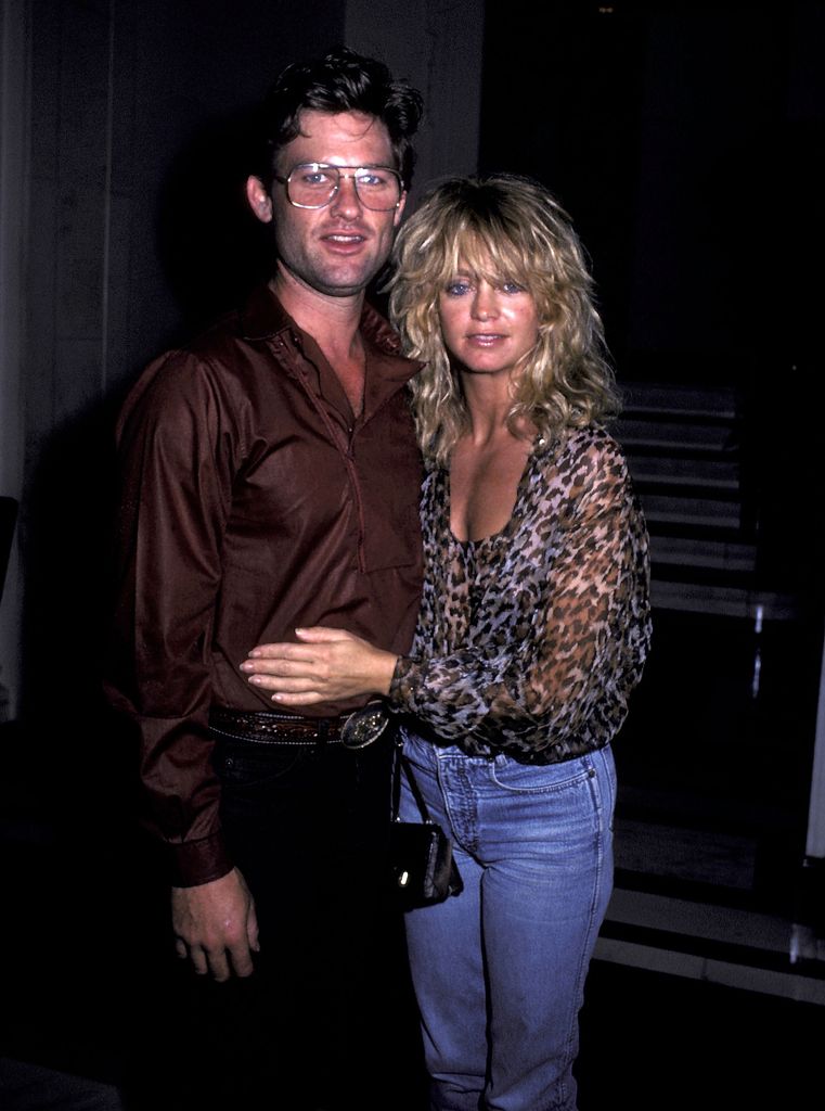 Kurt Russell and Goldie Hawn on July 23, 1983 leave the Carlyle Hotel for a night out in New York City