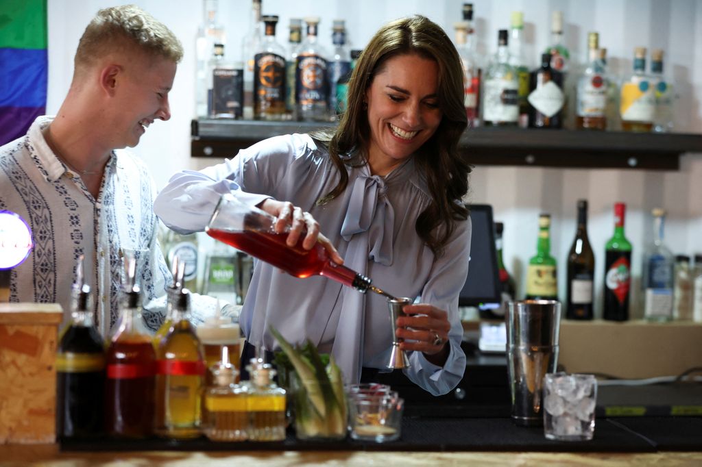 atherine, Princess of Wales makes a cocktail as she visits the Trademarket outdoor market, as part of the royal visit to Northern Ireland