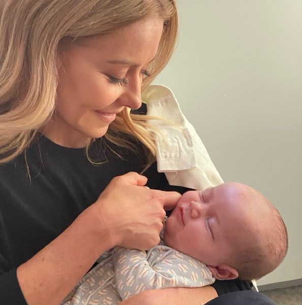 kelly ripa with anderson coopers son sebastian