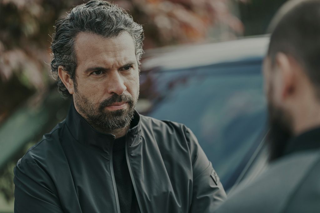 close-up of man in black leather jacket