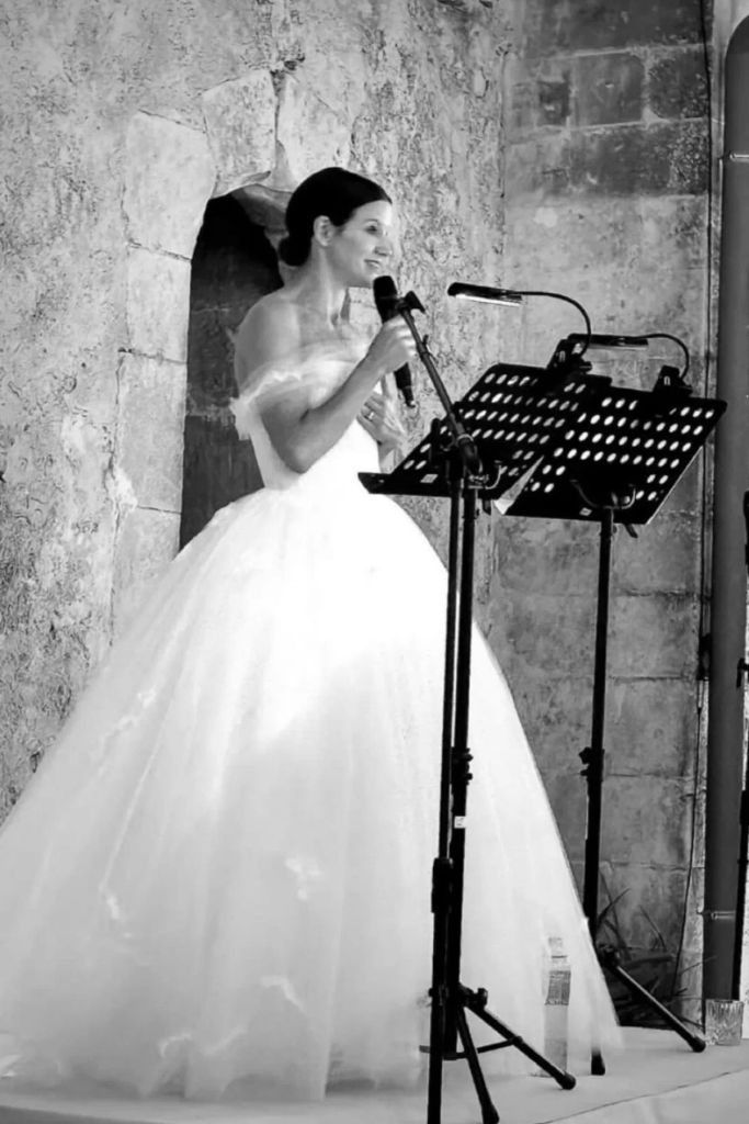 Kate making a speech in black and white photo