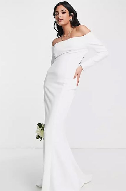 model wearing off shoulder white asos gown