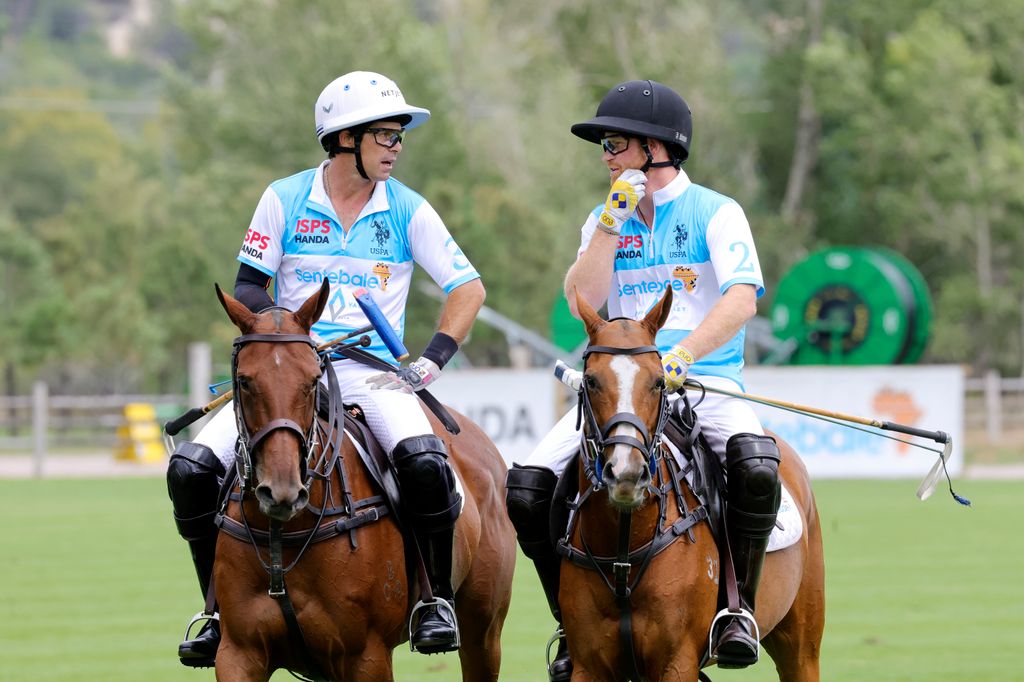 Nacho Figueras and Prince Harry, Duke of Sussex play polo
