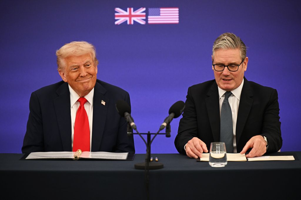 Donald Trump and Keir Starmer giving a conference