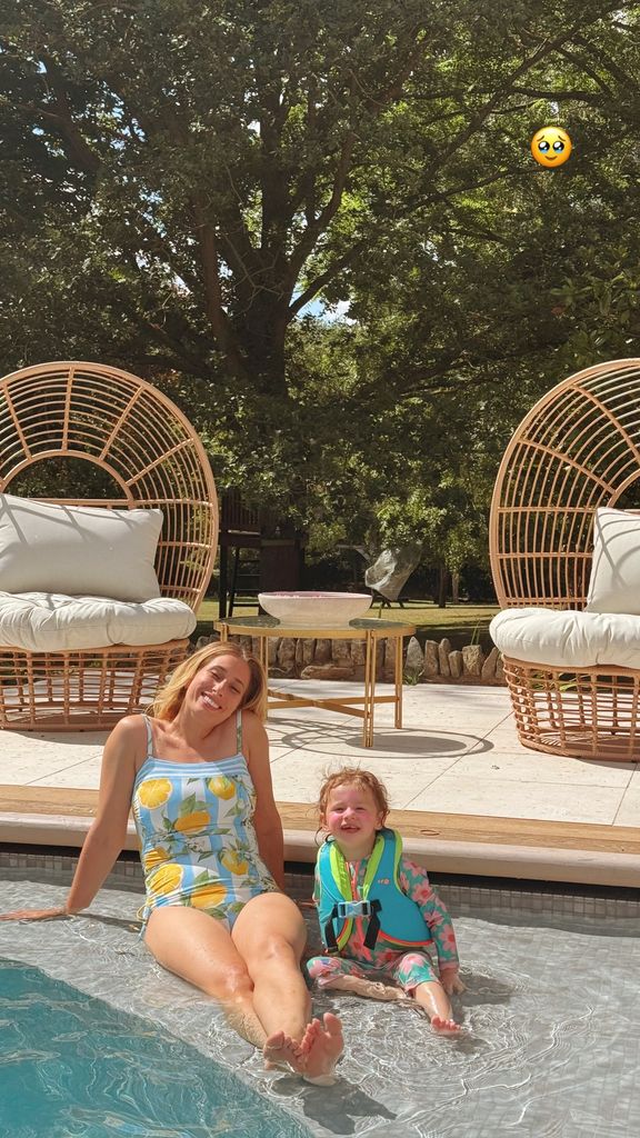 Stacey and Belle by swimming pool
