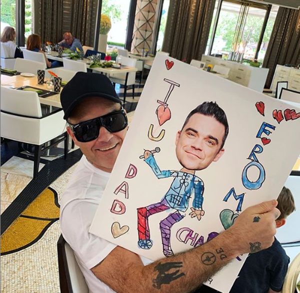 robbie williams and son reunited