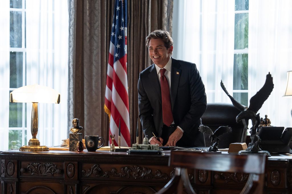 Man in suit in Oval office