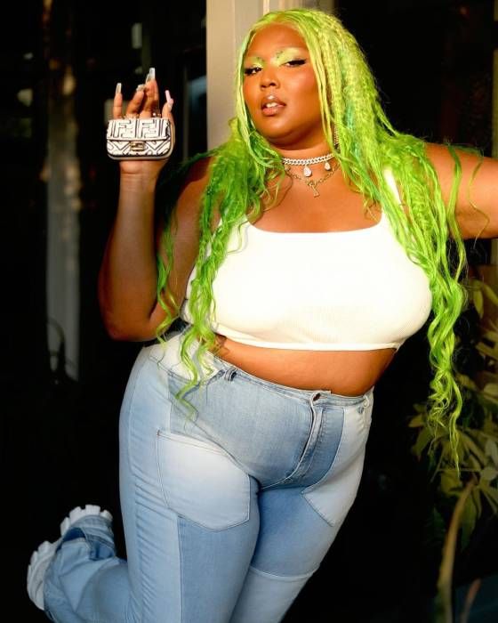 lizzo green hair denim outfit