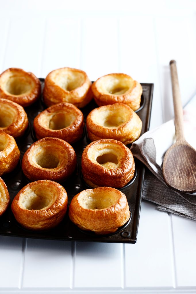 Yorkshire puddings on tray on kitchen counter