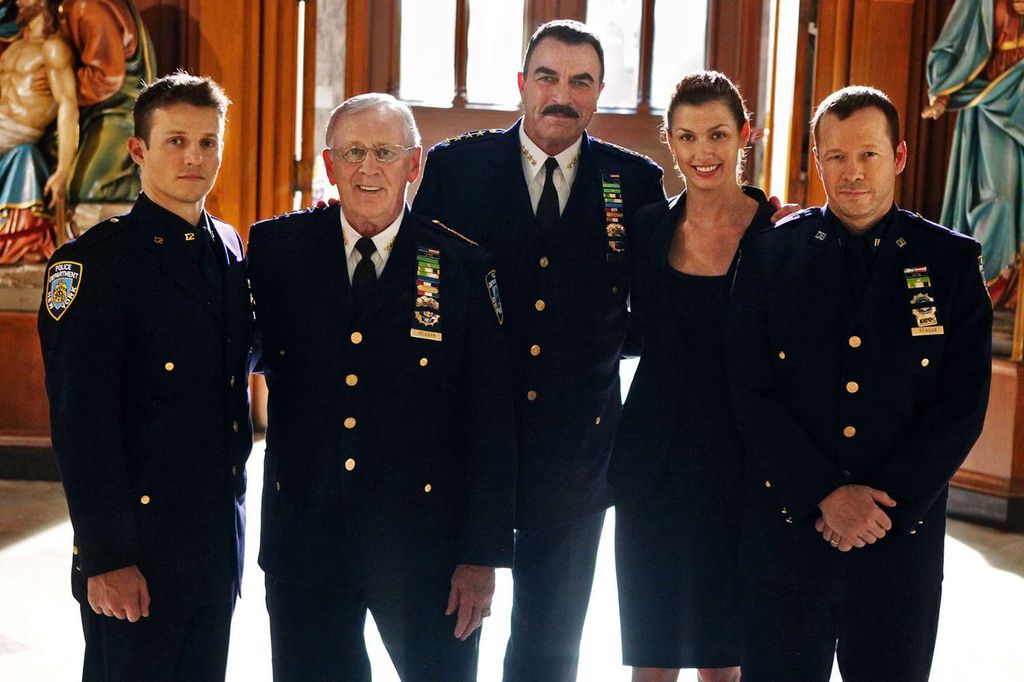 Tom Selleck (center) stars as patriarch Frank Reagan in Blue Bloods