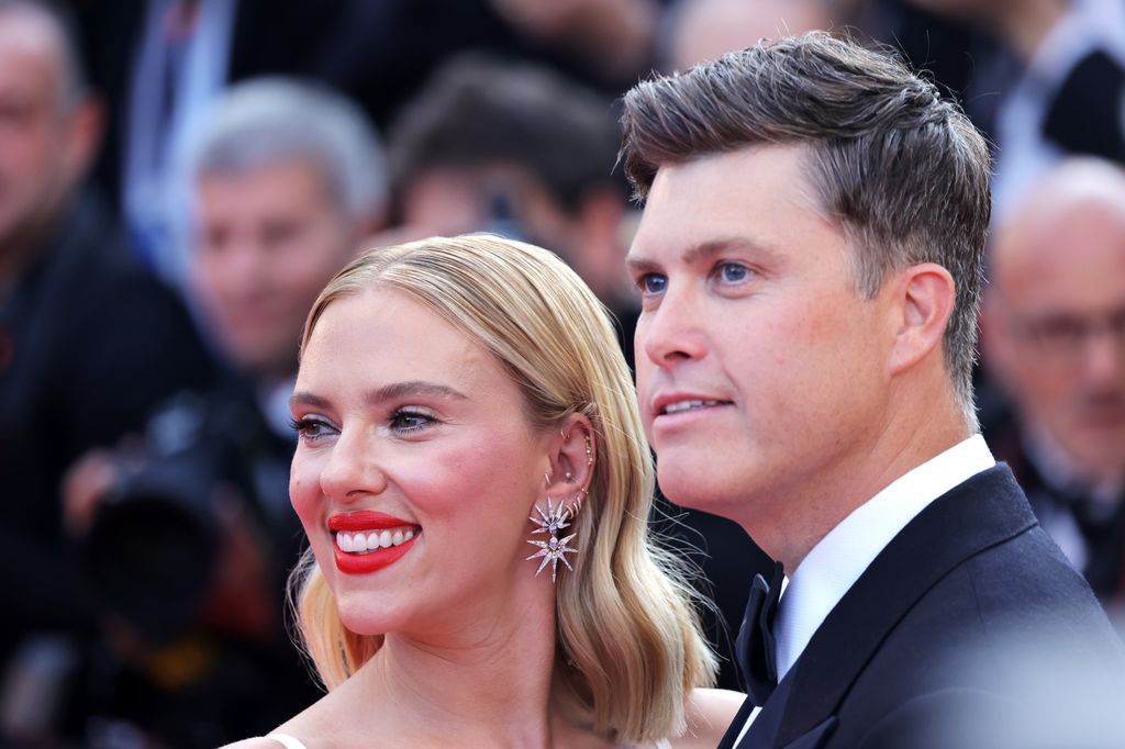 Scarlett Johansson and Colin Jost attend the "Asteroid City" red carpet during the 76th annual Cannes film festival at Palais des Festivals on May 23, 2023 in Cannes, France.