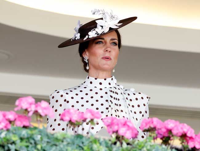 Kate Middleton in a polka dot hat looking smart
