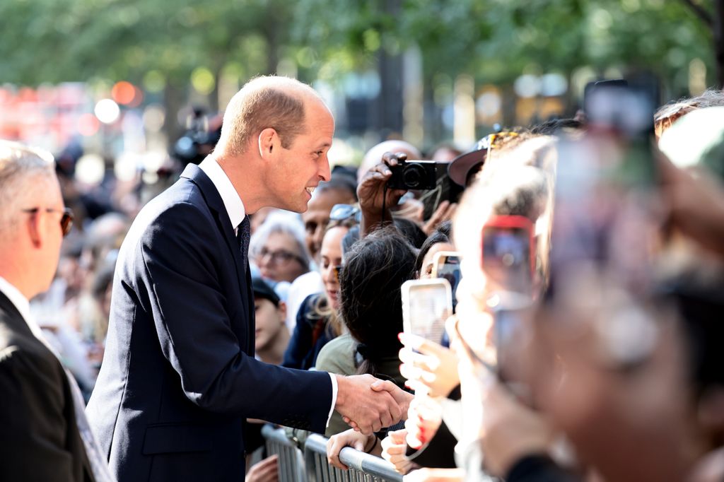 William greets members of the public in New York