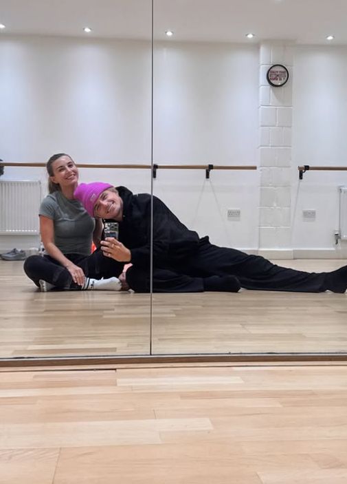 Dani Dyer with Nikita Kuzmin in a training room