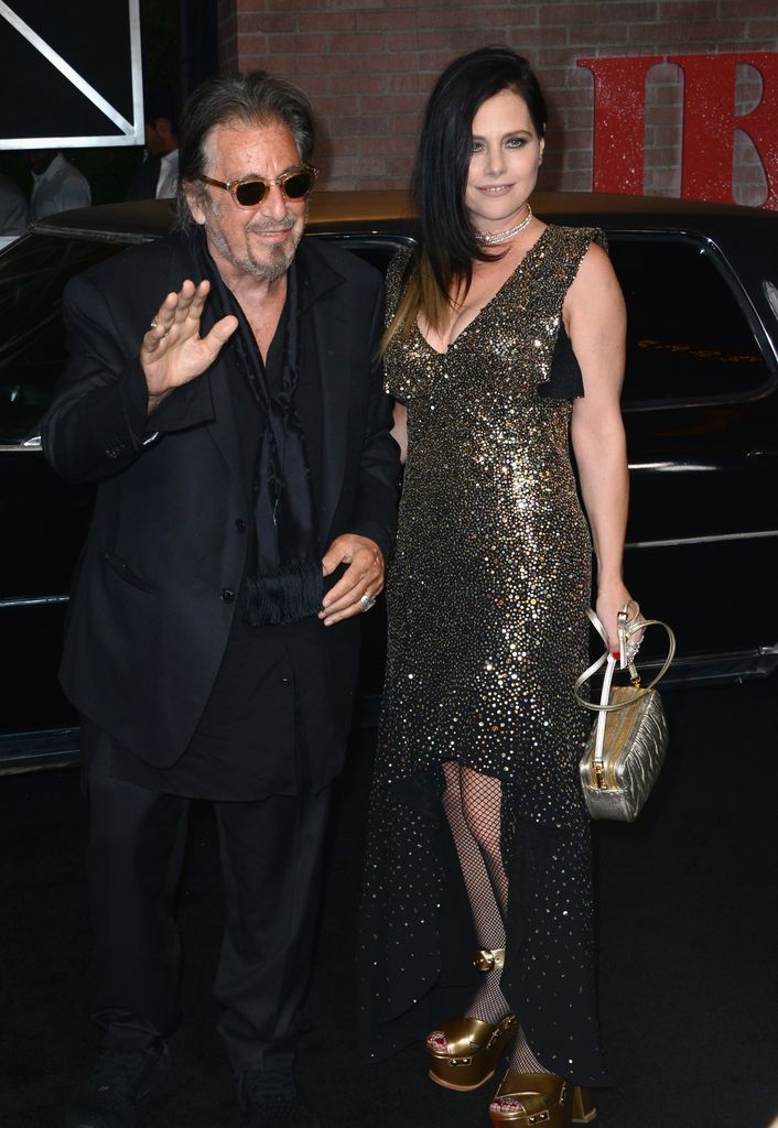 Al Pacino standing with Meital Dohan at Irishman premiere