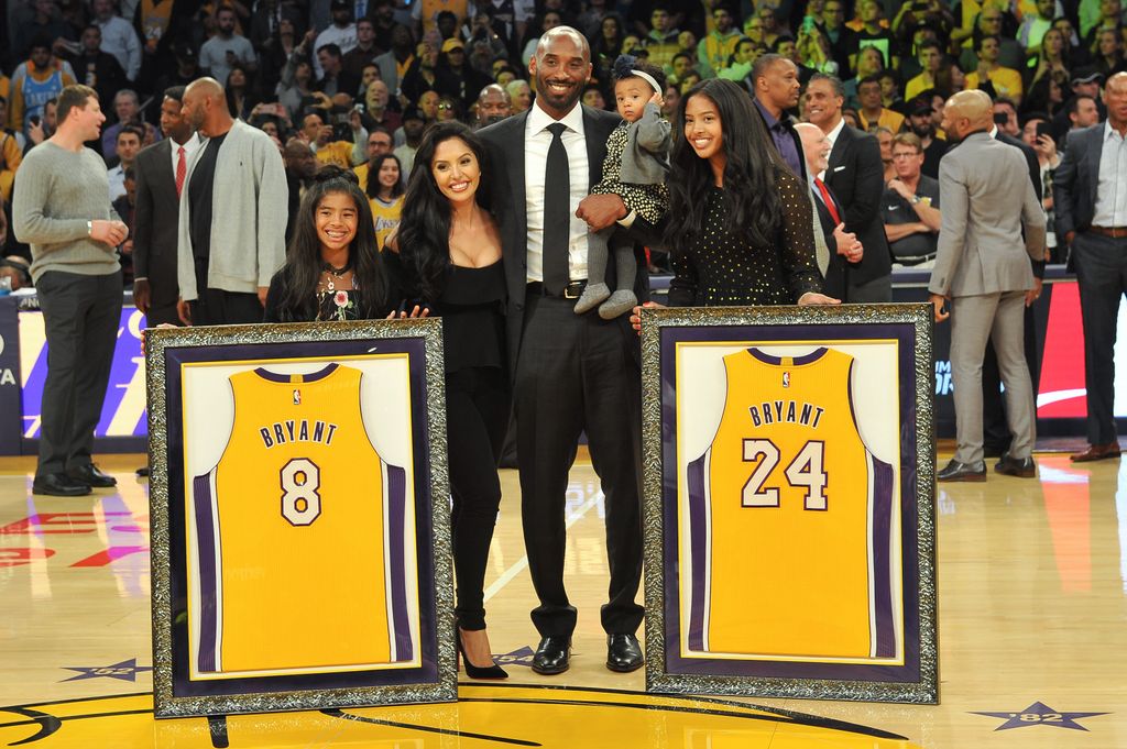 Kobe Bryant, wife Vanessa Bryant and daughters Gianna Maria Onore Bryant, Natalia Diamante Bryant and Bianka Bella Bryant attend Kobe Bryant's jersey retirement ceremony at Staples Center on December 18, 2017 in Los Angeles, California