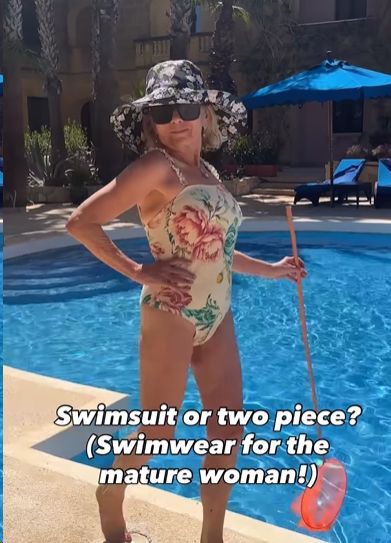 Woman in floral swimsuit by pool