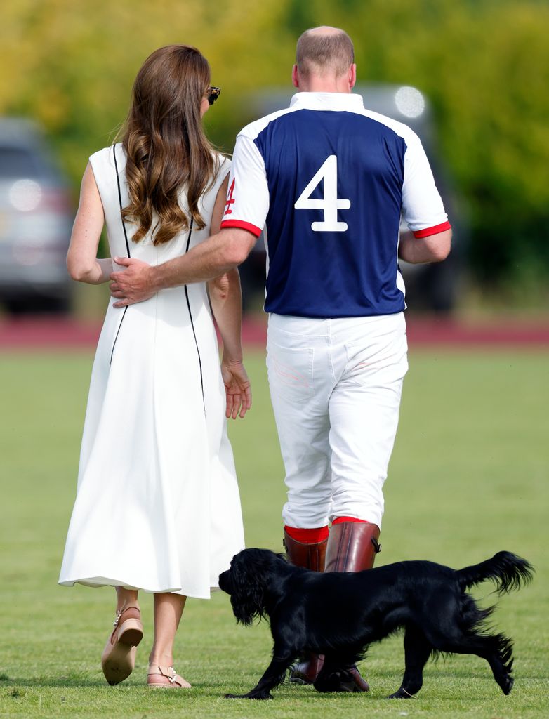 Catherine, Duchess of Cambridge and Prince William, Duke of Cambridge, with their dog 'Orla', attend the Out-Sourcing Inc. Royal Charity Polo Cup
