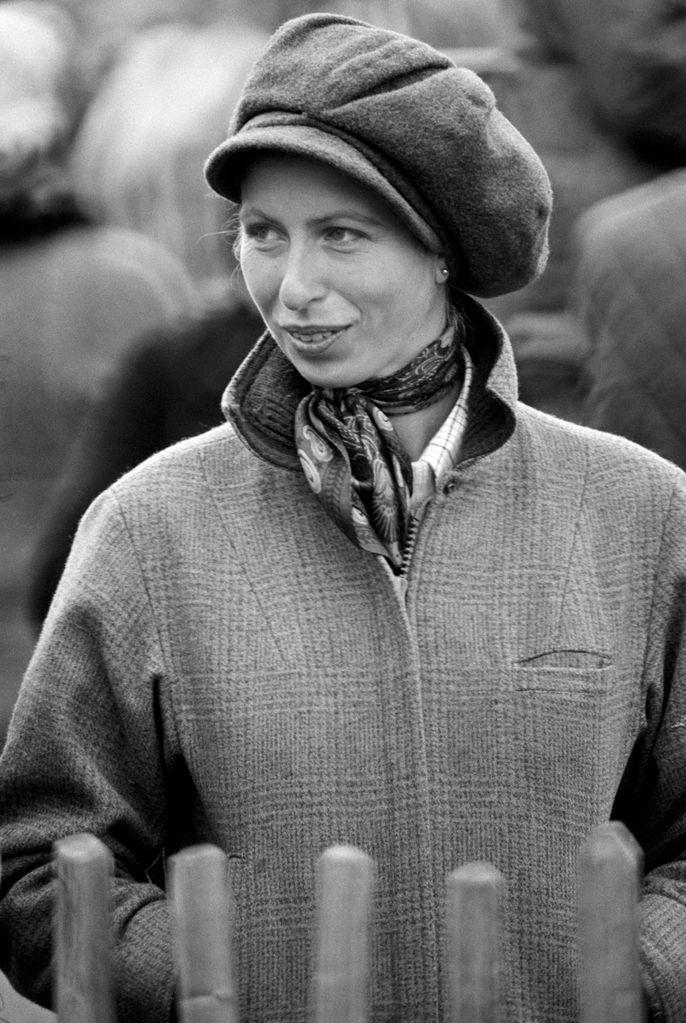 Princess Anne in 1975 in a stylish buffoon style tweed cap with a Barbour waterproof jacket